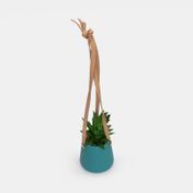 Planta artificial con maceta azul turquesa, sábila