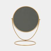 Espejo de mesa metálico dorado con base circular