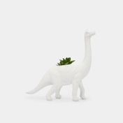 Figura de dinosaurio con plantas 24,7 x 24 x 7 cm