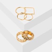 Set x 6 anillos dorados con diseño de formas