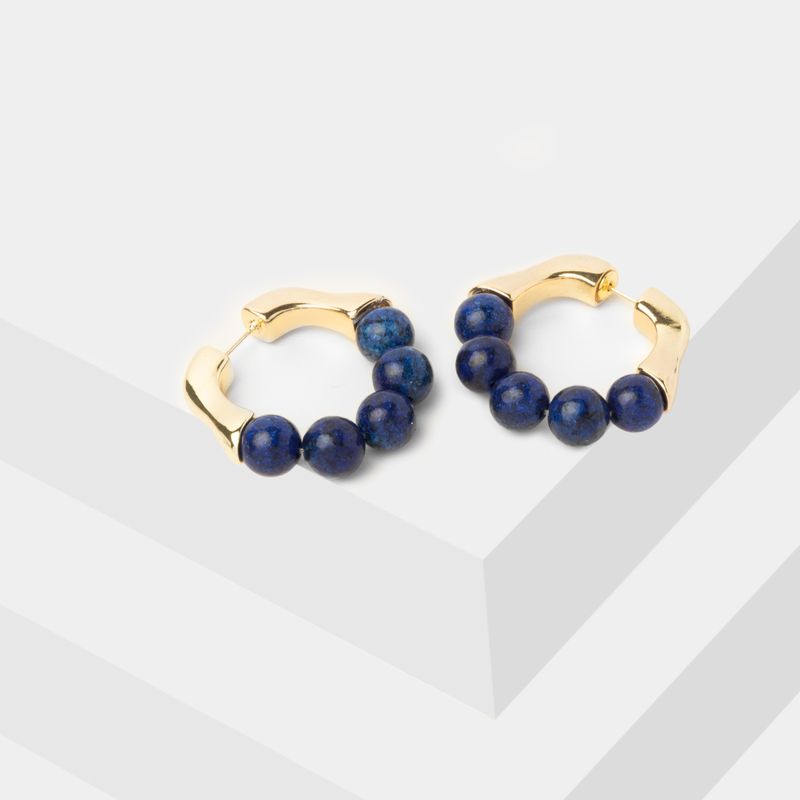 aretes-candongas-doradas-con-esferas-azules-7701016611732