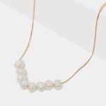 collar-liso-con-esferas-blancas-7701016615501