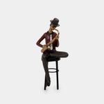 figura-de-24-cm-musico-sentado-con-saxofon-7701016945820