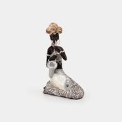 Figura de 17.2 cm mujer sentada con saxofón