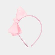 Diadema infantil delgada con moño rosada