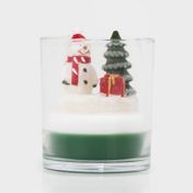 Vela en vaso de vidrio hombre de nieve con árbol y regalo